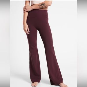 Athleta Elation Flare Pant. Never been worn. Price tag is still on them.